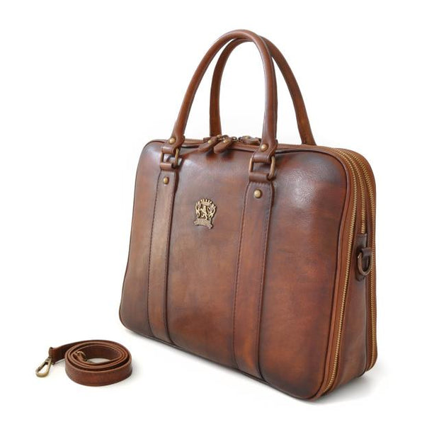 Side of Pratesi brown Magliano bruce leather briefcase. 