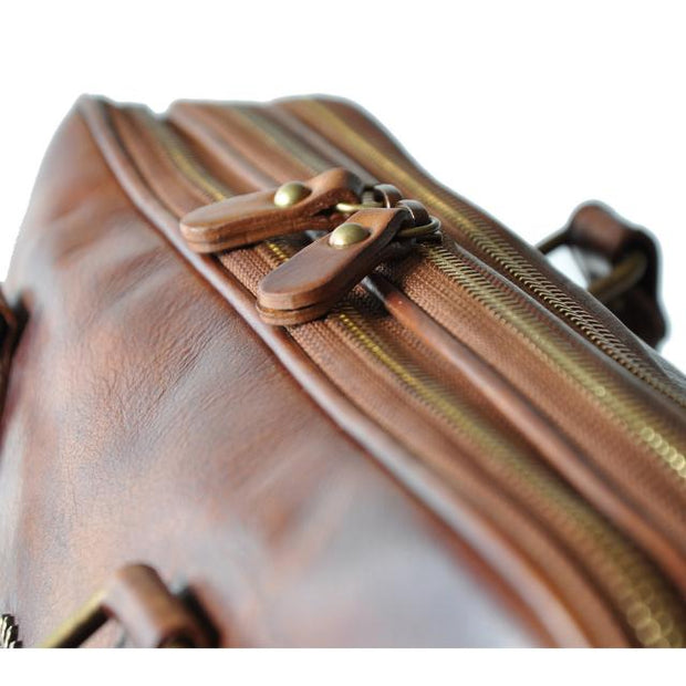 Close-up of Pratesi brown Magliano bruce leather briefcase. 