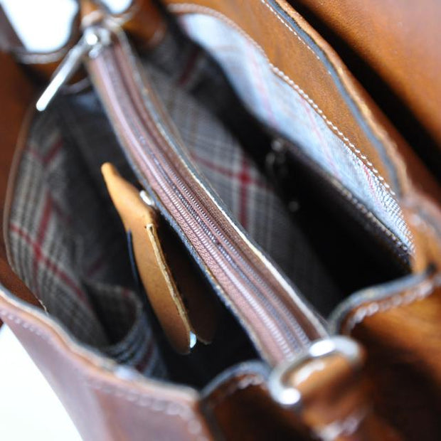 Inside of Pratesi brown Baratti leather handbag. 