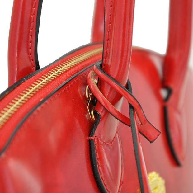 Close-up of Pratesi Versilia Small red leather hand bag. 