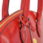 Close-up of Pratesi Versilia Small red leather hand bag. 