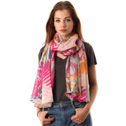 Belmore Boutique pink and purple floral print silk scarf on model. 