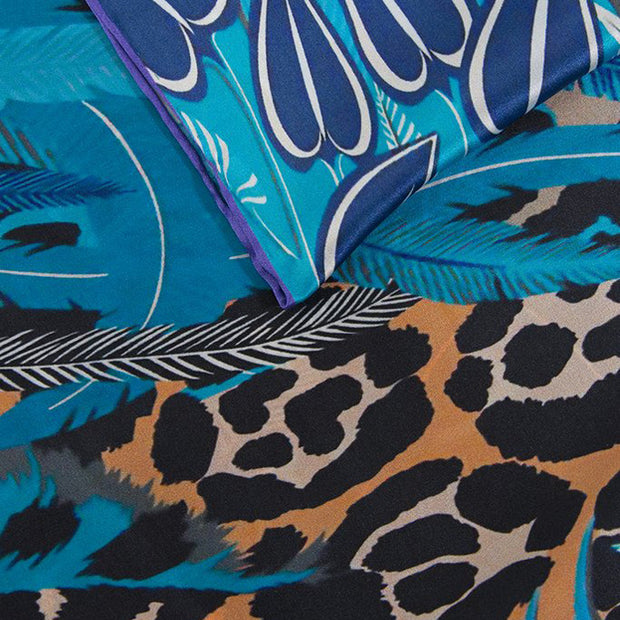 Belmore Boutique blue and cream leopard jungle print silk scarf.